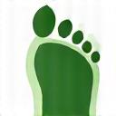 An infographic icon showing a leaf inside a reduced carbon footprint outline.